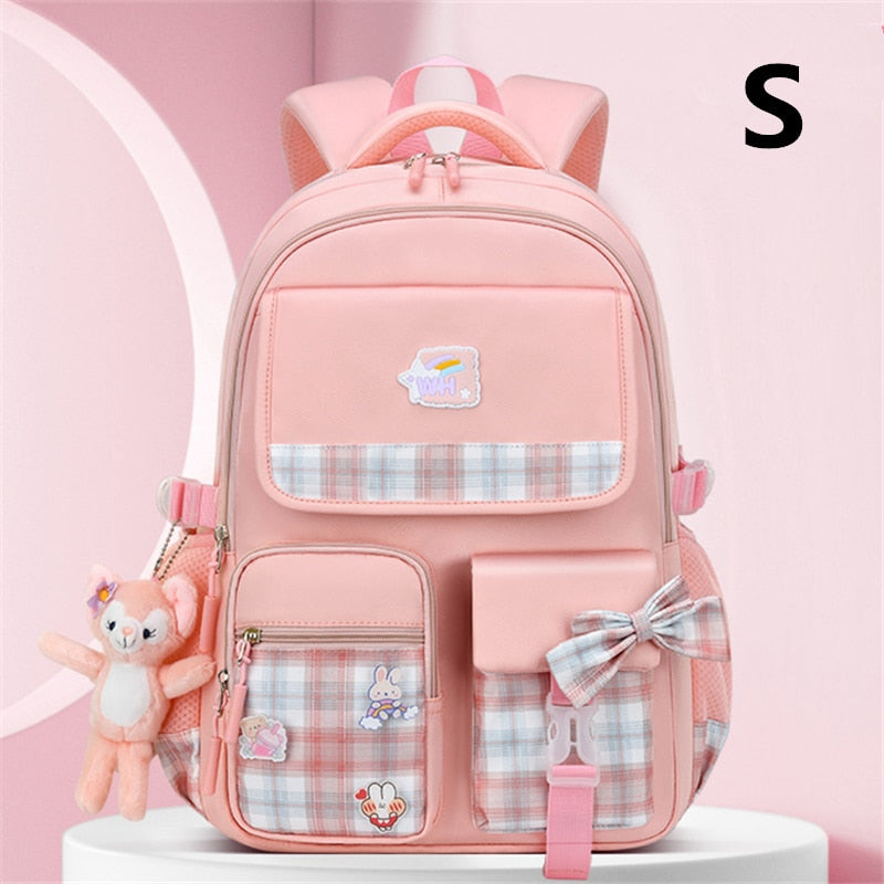 2023 New Bowknot schoolbag for teenage girls High capacity orthopedic backpack  With cartoon pendant School Bags 2 Size Satchel