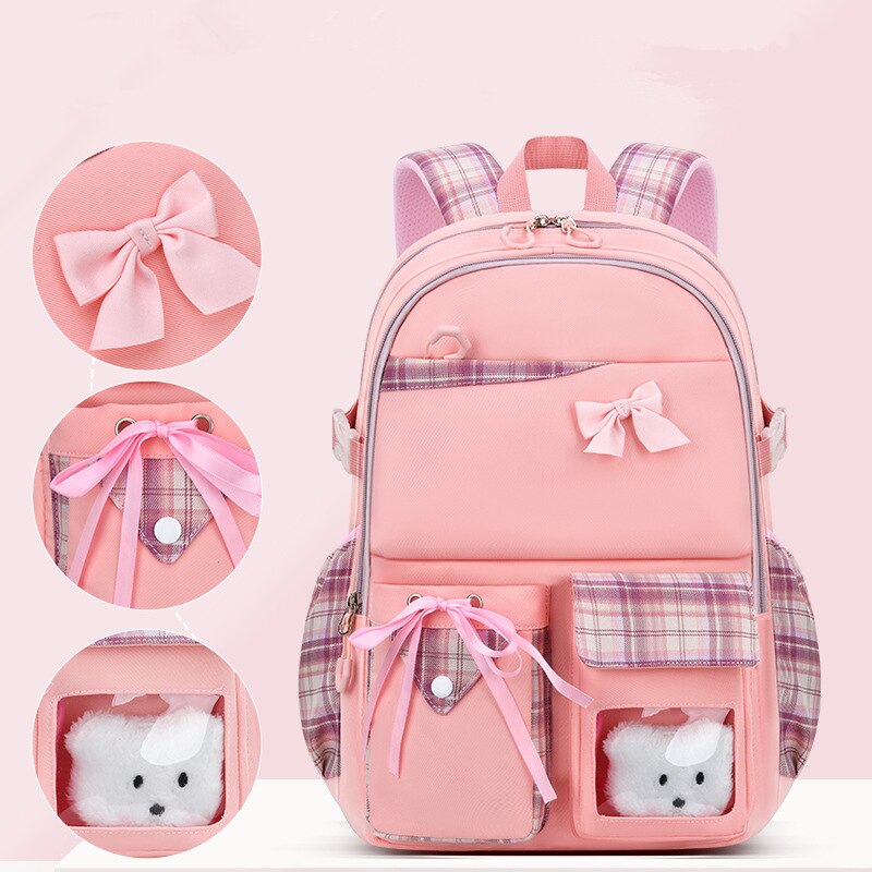 2023 New Bowknot schoolbag for teenage girls High capacity orthopedic backpack  With cartoon pendant School Bags 2 Size Satchel