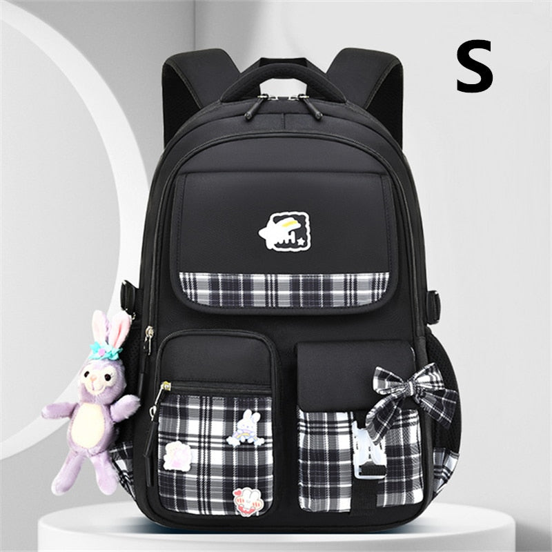 2023 New Bowknot schoolbag for teenage girls High capacity orthopedic backpack  With cartoon pendant School Bags 2 Size Satchel